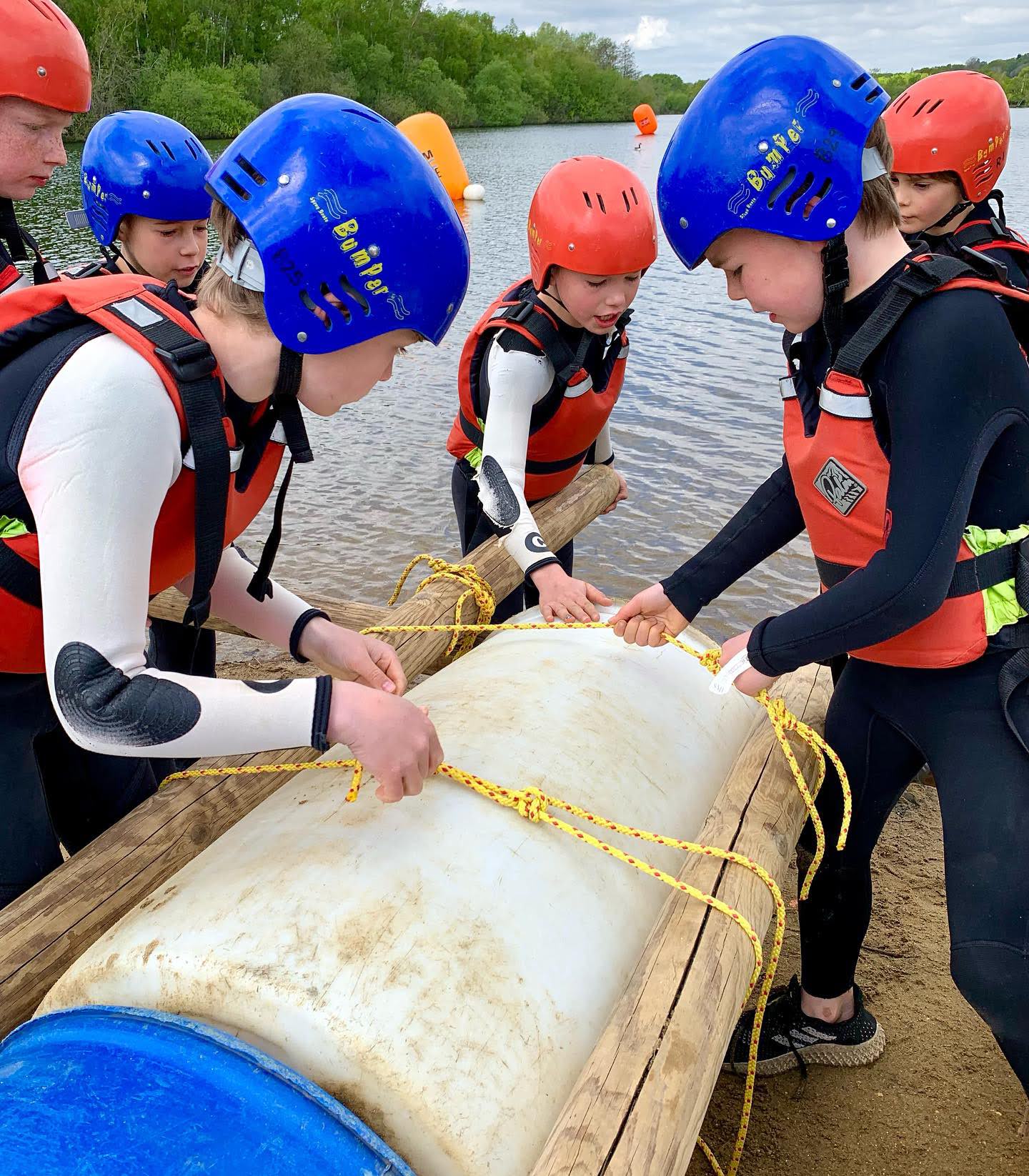 Team building exercise to build a raft